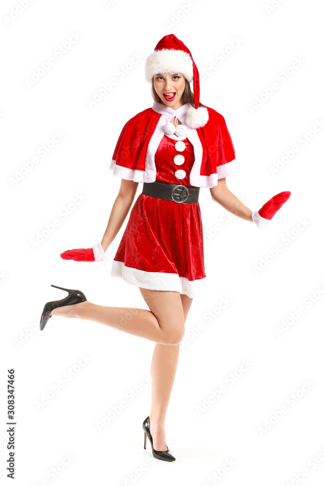 Beautiful young woman in Santa costume on white background Beautiful young woman in Santa costume on white background