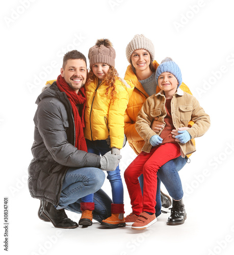 Happy family in winter clot...