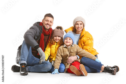 Happy family in winter clot...