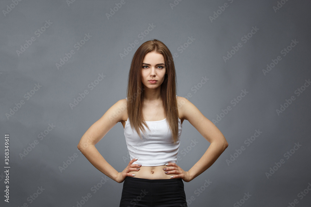 girl posing on gray background girl posing on gray background