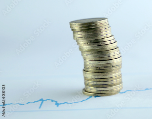Rising coins ,Pile of mixed iron money coins background