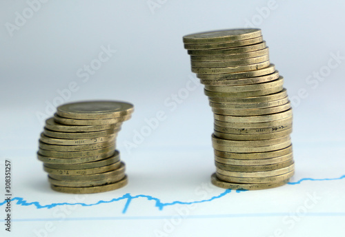 Rising coins ,Pile of mixed iron money coins background