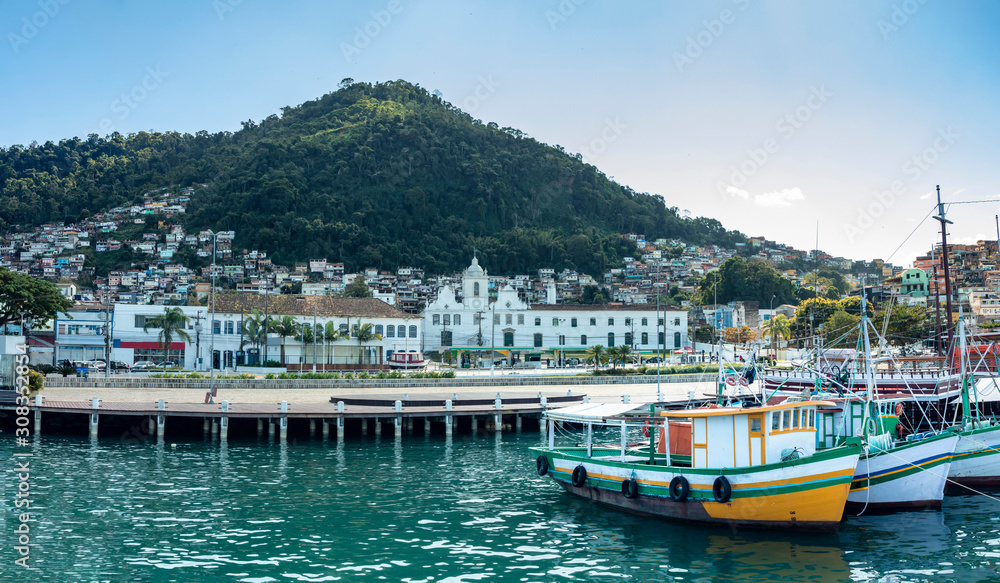 View of the port and city of Angra dos Reis with boats and pier for landscaping, state of Rio de Janeiro Brazil South America