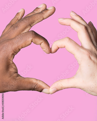 Heart formed by hands African American Caucasian. Diversity and Valentines concept