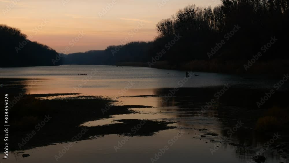 Winter Wetlands and Orange Glow Evening Sky Winter Wetlands and Orange Glow Evening Sky