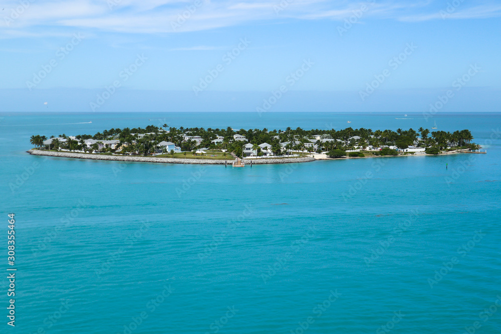 Obraz premium Aerial view of Sunset Key, a 27-acre residential neighborhood and resort island in the city of Key West, Florida, United States. It is located about 500 yards off the coast of Key West.&nbsp;