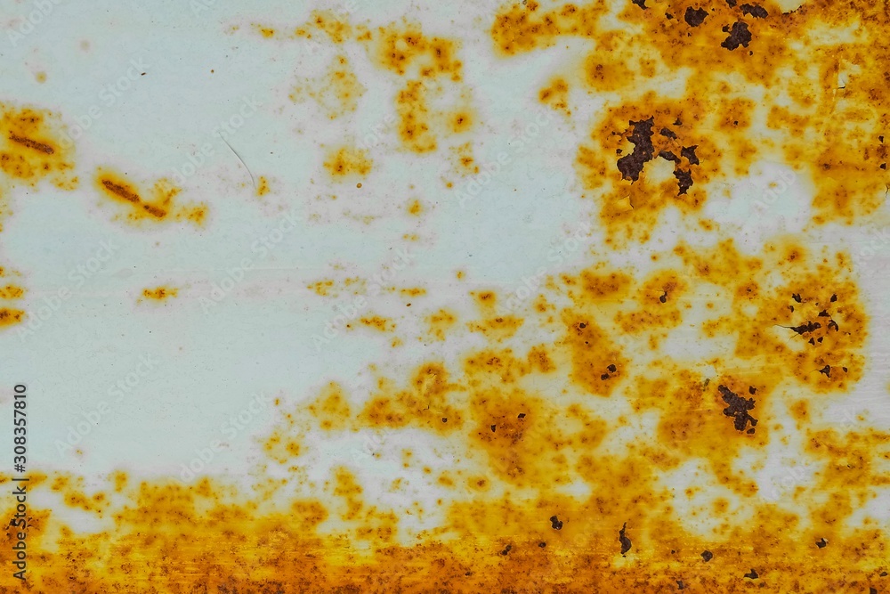 Close-up of Rust on Old metal iron panel. Grunge rusted metal. Old wall texture background. Close-up of Rust on Old metal iron panel. Grunge rusted metal. Old wall texture background.