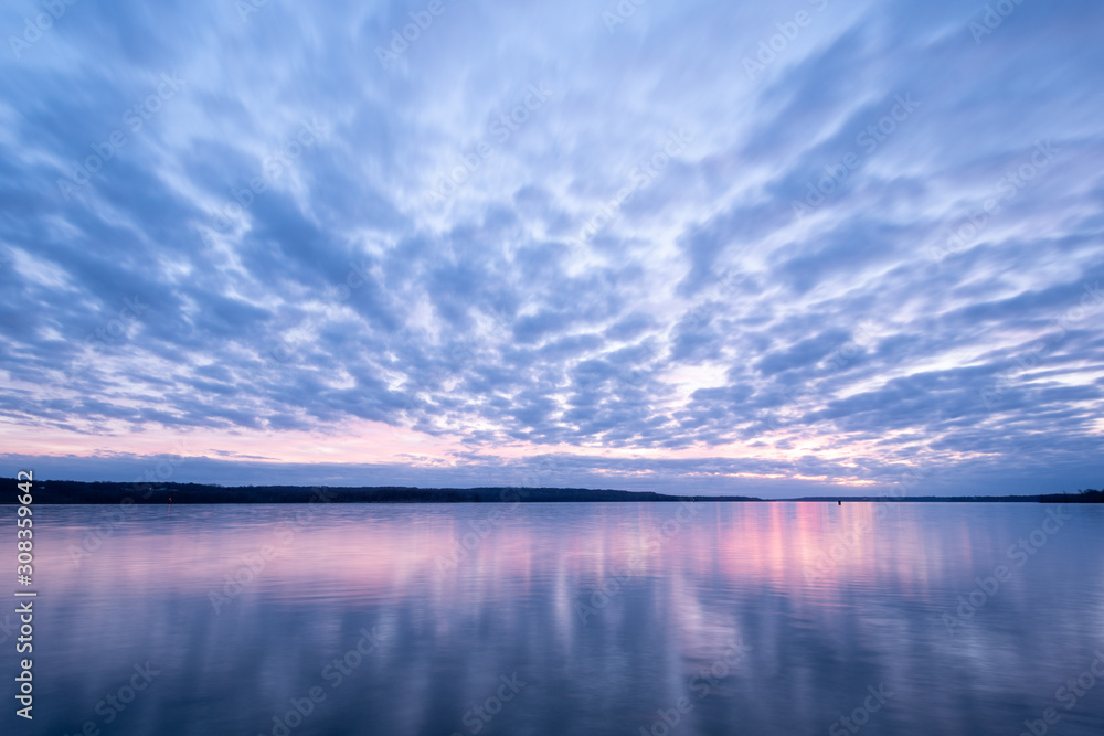 Blue and Pink Sky Over Calm Lake at Dusk
