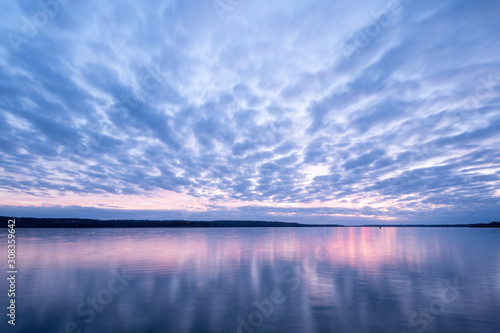 Blue and Pink Sky Over Calm Lake at Dusk