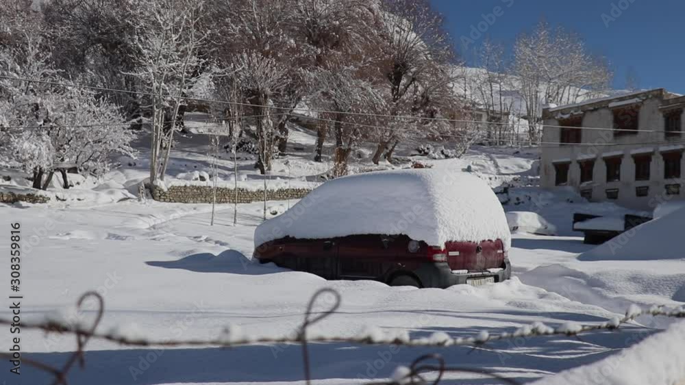 snow covered car during winter in ladakh snow covered car during winter in ladakh