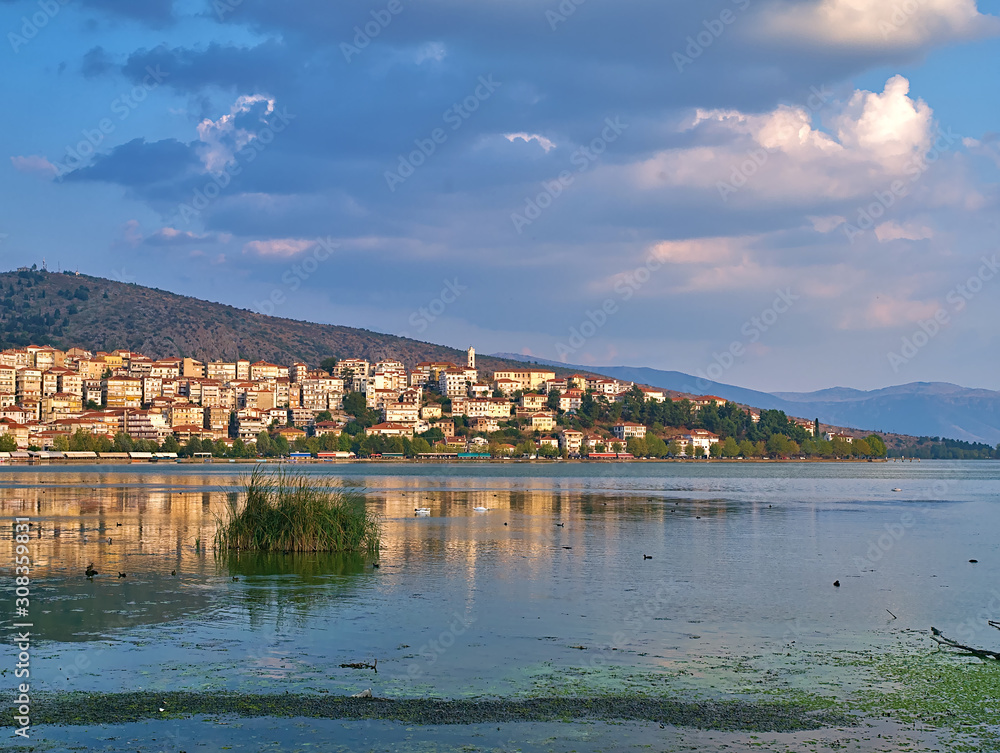 Lake Orestiada  and Kastoria city, Greece at sunset time.