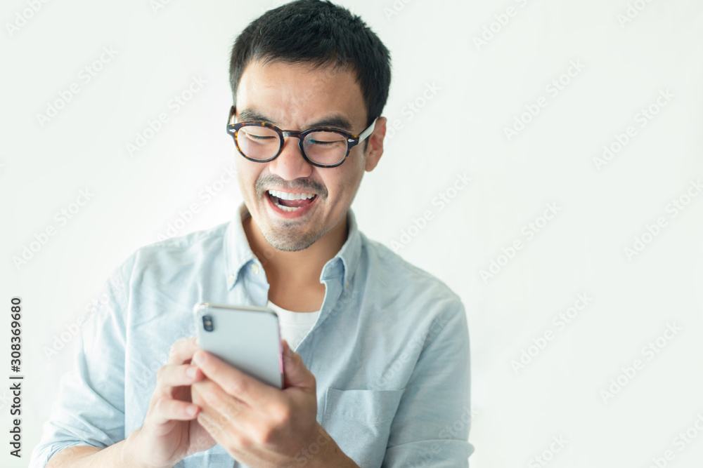 asian man using cell phone.hand holding texting message on screen mobile chatting friend on white background.technology device contact communication connecting people concept asian man using cell phone.hand holding texting message on screen mobile chatting friend on white background.technology device contact communication connecting people concept