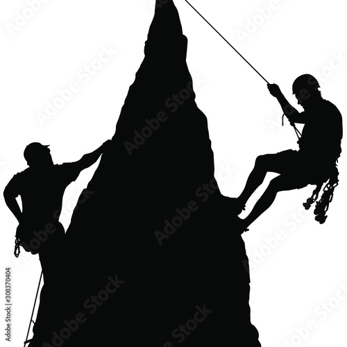 Vector silhouettes of men rock climbing. photo