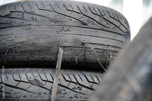 Heavy used old tire in the garage