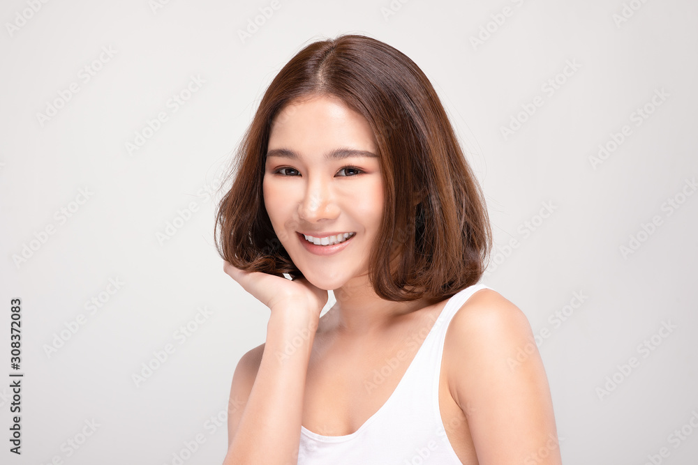 Beautiful Asian woman with short hair looking at camera smile with clean and fresh skin Happiness and cheerful with positive emotional,isolated on gray background,Beauty and Cosmetics Concept Beautiful Asian woman with short hair looking at camera smile with clean and fresh skin Happiness and cheerful with positive emotional,isolated on gray background,Beauty and Cosmetics Concept