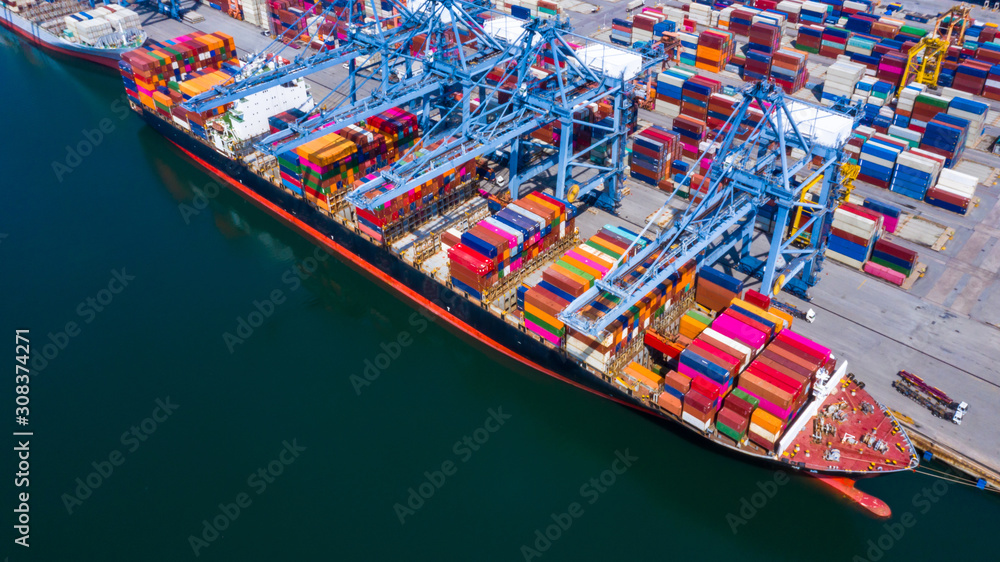 Aerial view container  ship at industrial port in import export business logistic and transportation of international by container ship in the open sea.