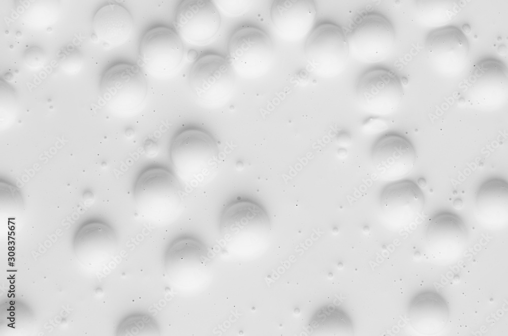 White liquid paint bubbles texture as abstract background. White liquid paint bubbles texture as abstract background.
