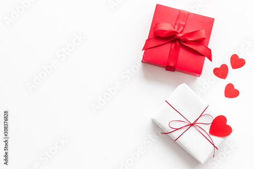 Wallpaper Mural Present to a lover on Valentine's Day. Gift boxes near paper hearts on white background top-down frame copy space Torontodigital.ca