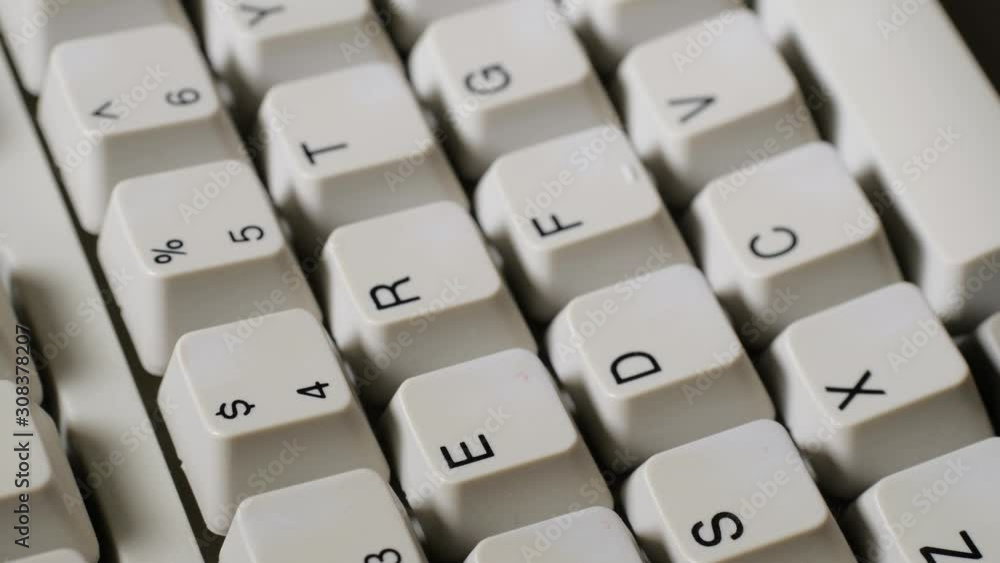 Finger presses nomber 4 or $ button on keyboard Finger presses nomber 4 or $ button on keyboard