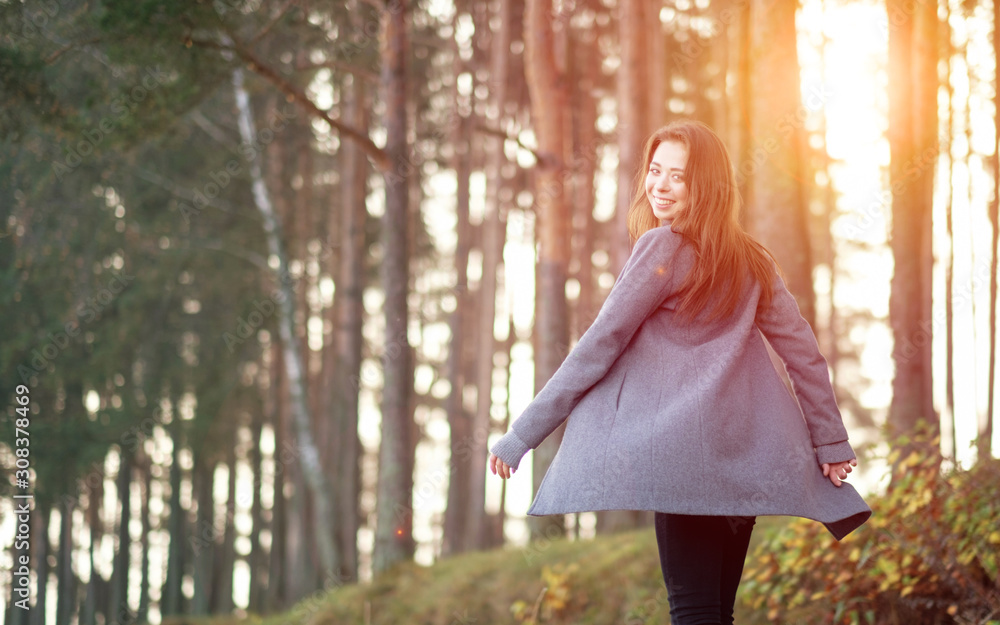 happy attractive young woman walks and dance in autumn forest, fashion model happy attractive young woman walks and dance in autumn forest, fashion model