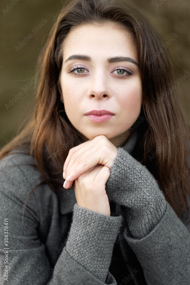 beauty art portrait of young attractive woman in coat in park, fashion model with clean skin, natural cosmetics and makeup beauty art portrait of young attractive woman in coat in park, fashion model with clean skin, natural cosmetics and makeup