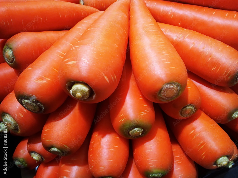 Close-up of fresh orange carrots on the market Close-up of fresh orange carrots on the market