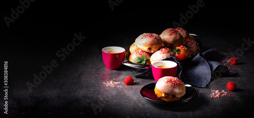Delicious Berlin donuts filled with raspberry jam