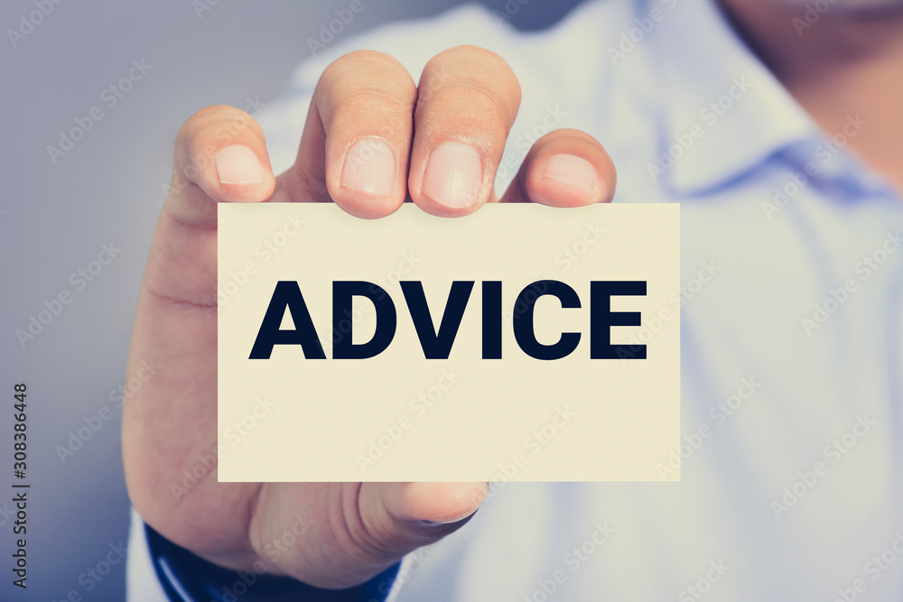 ADVICE word on the card shown by a man ADVICE word on the card shown by a man