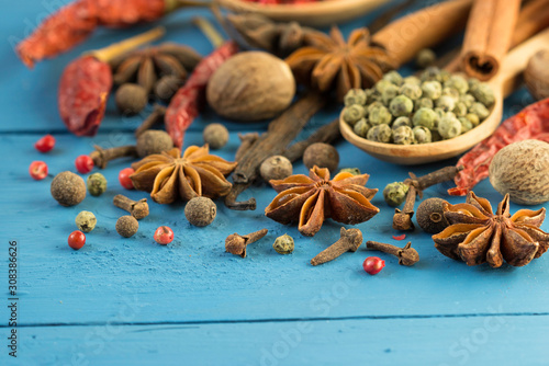 Natural aroma spices for cooking food  on a blue background.
