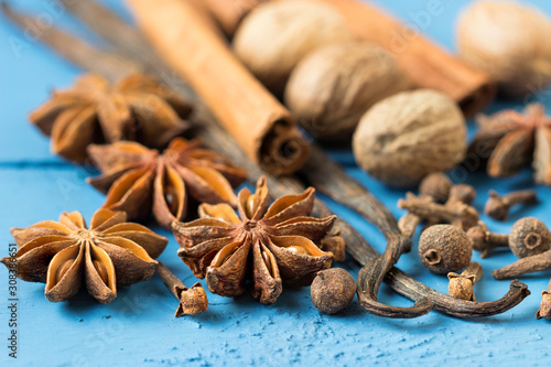 Natural aroma spices for pastry on a blue background.