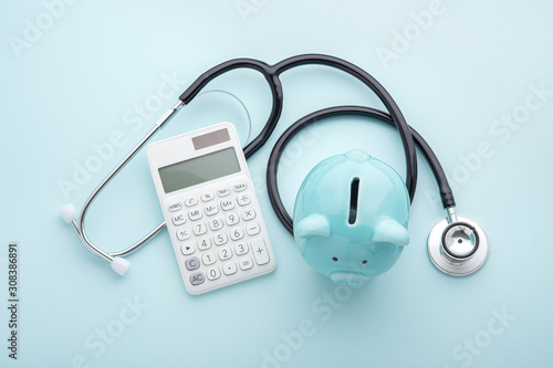 Health insurance, tax concept on blue background