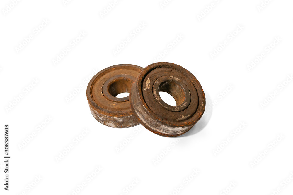 Rusty stuck ball bearings on a white background isolated Rusty stuck ball bearings on a white background isolated