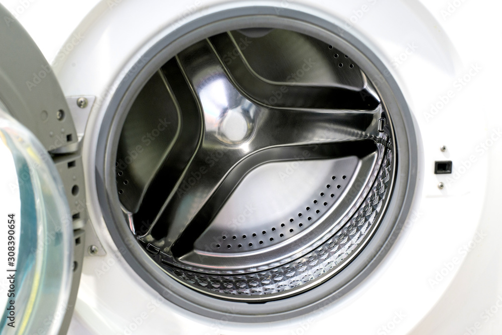 Washing machine, close up showing open door and drum