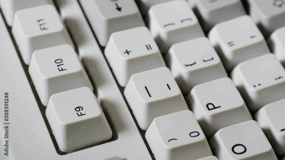 Finger presses F9 button on keyboard Finger presses F9 button on keyboard