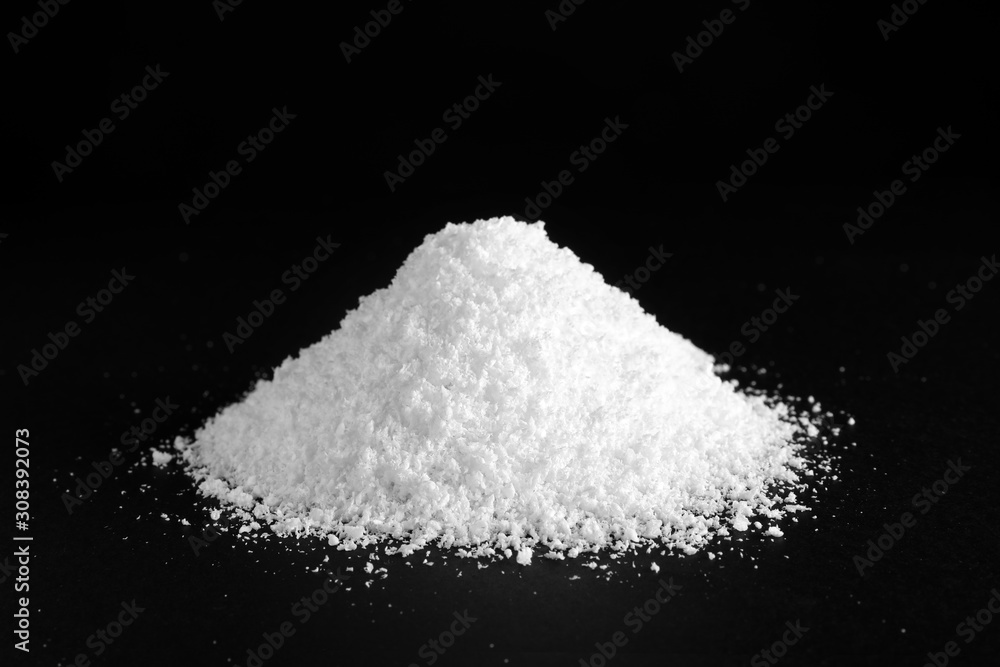 Heap of white snow on black background Heap of white snow on black background