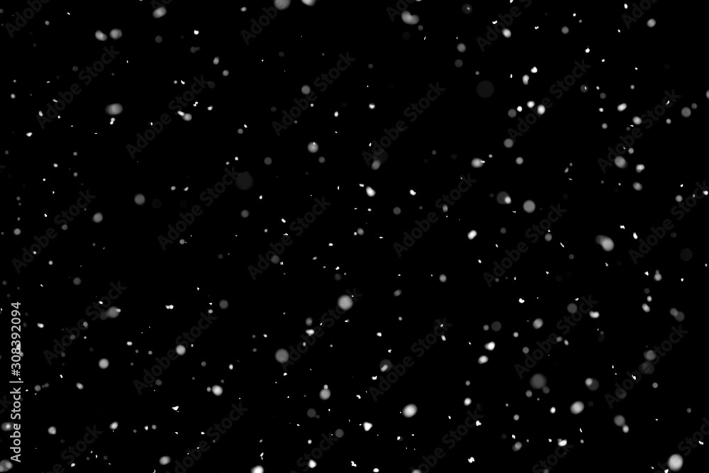White snow falling down on black background White snow falling down on black background