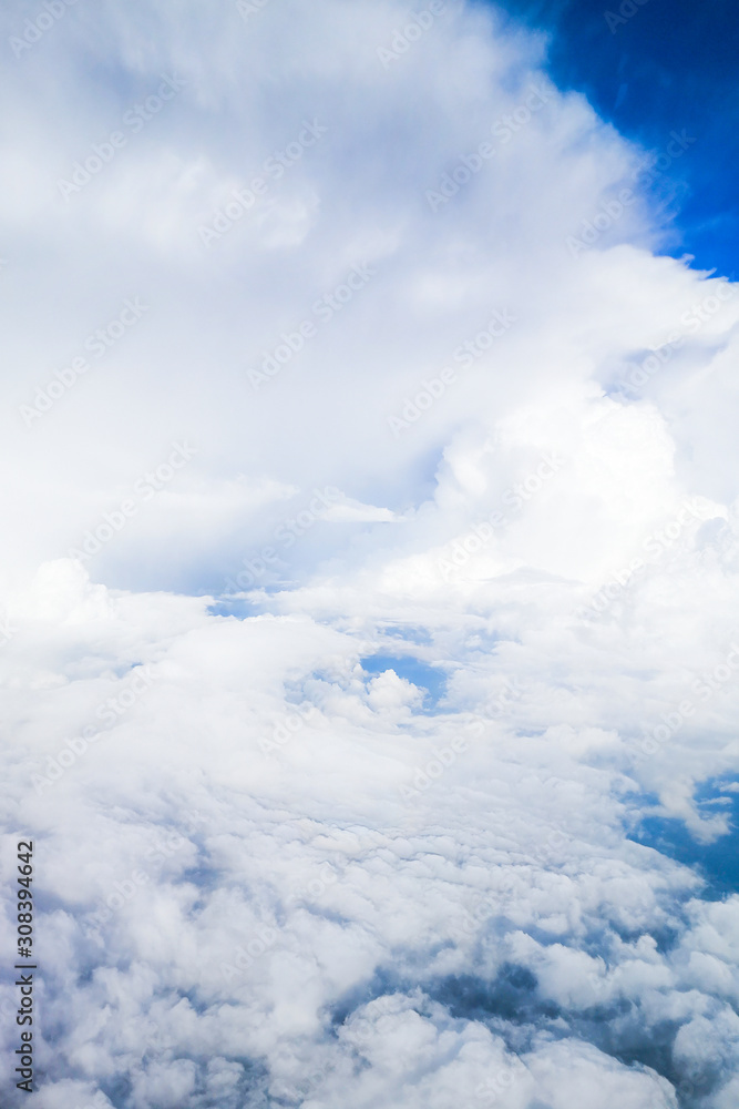 White clouds and sky view from the airplane window. White clouds and sky view from the airplane window.