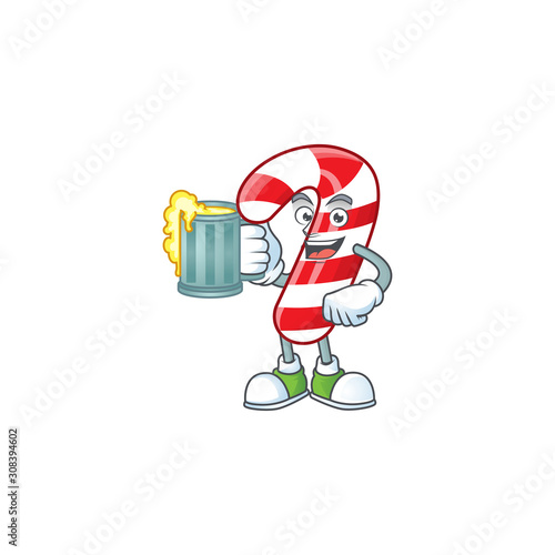Happy christmas candy cane holding a glass of beer