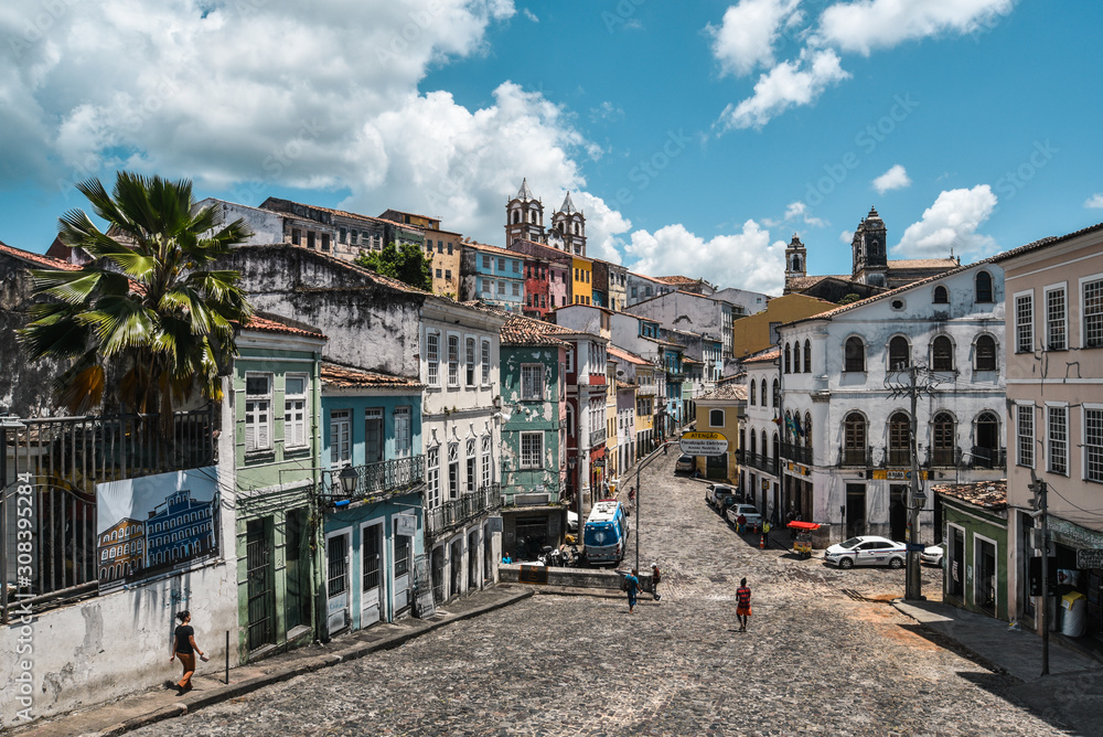 Obraz premium Salvador, Bahia / Brasil - 11/14/2019: Cityscape of old part of Salvador Bahia with colorful houses and beautiful clouds and blue sky 