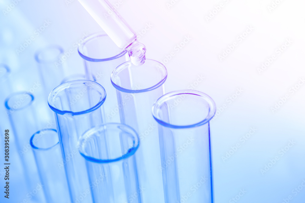 Science laboratory test blue tubes, macro flask equipment. Chemical dropper Science laboratory test blue tubes, macro flask equipment. Chemical dropper