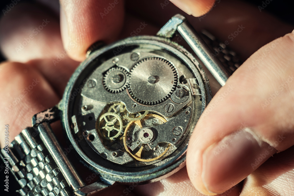 Watchmaker is repairing the wristwatch, mechanical watch Watchmaker is repairing the wristwatch, mechanical watch