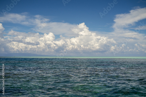 Three tones of sea under a beutiful sky. Dark blue and turquoise green in Semporna Islands  Borneo  Sabah.