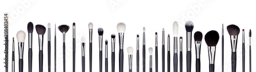 Obraz na plátně Set of make-up brushes lined up in alternating pattern