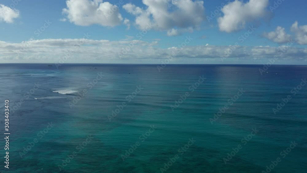day view of Pacific Ocean flying backward revealing Waikiki Beach day view of Pacific Ocean flying backward revealing Waikiki Beach