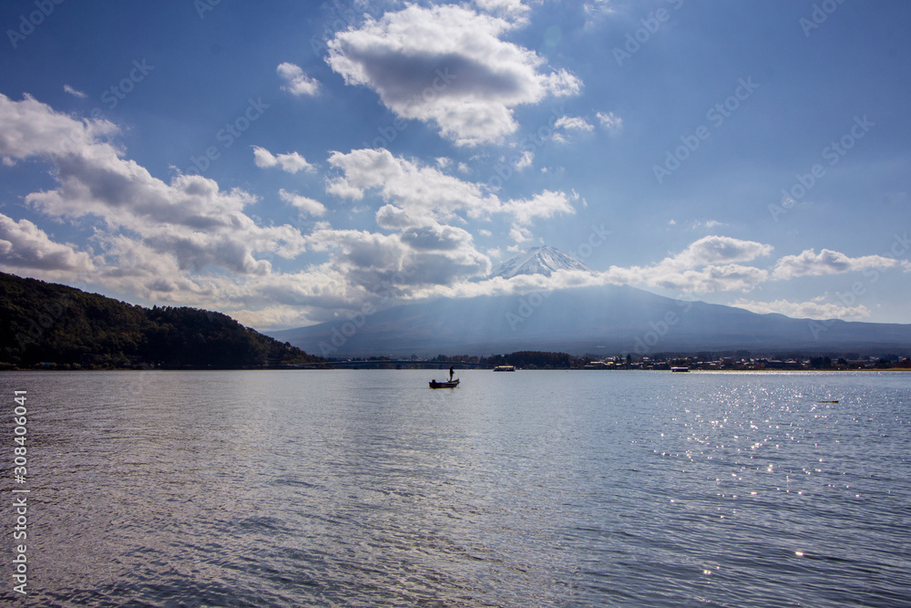 Fisherman in Kawaguchi lake with Mount Fuji in the background, Japan. Fisherman in Kawaguchi lake with Mount Fuji in the background, Japan.