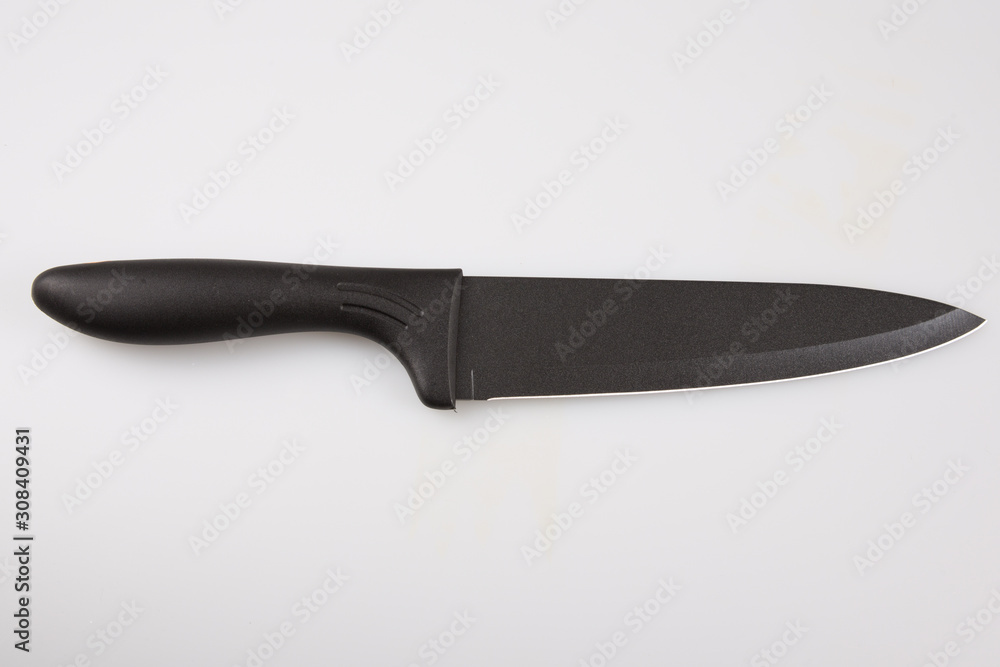 Butcher black Kitchen Knife on isolated white background Butcher black Kitchen Knife on isolated white background