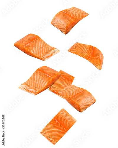 Falling raw salmon, fish isolated on white background, clipping path, full depth of field