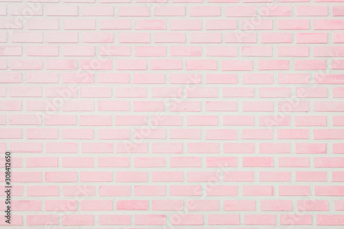 Pastel Pink and White brick wall texture background. Brickwork or stonework flooring interior rock old pattern clean concrete grid uneven bricks design stack. © Phokin