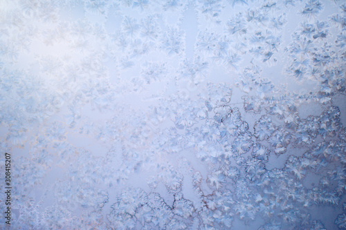 Textural abstract background of frozen glass.
