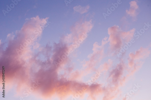 Blue sky, pink clouds, sunset.